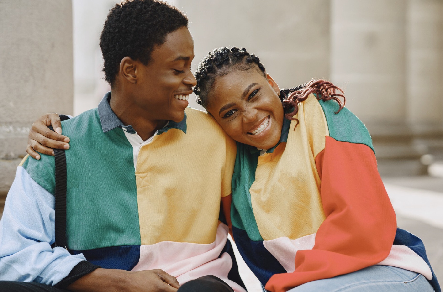Matching jackets, matching grins.