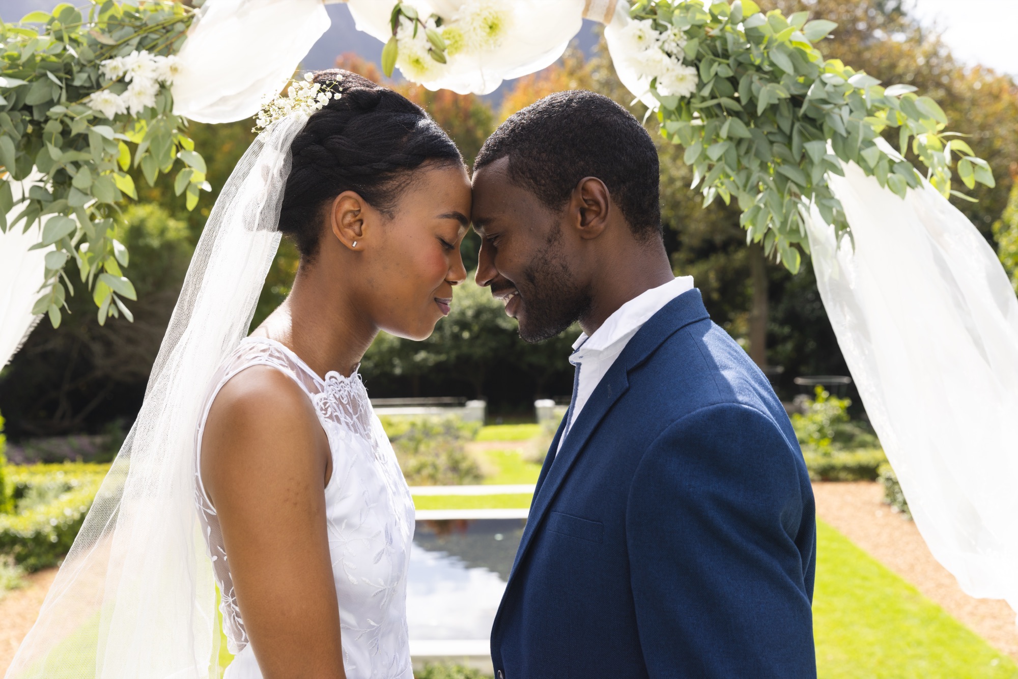 Newlyweds sharing an intimate moment at their ceremony