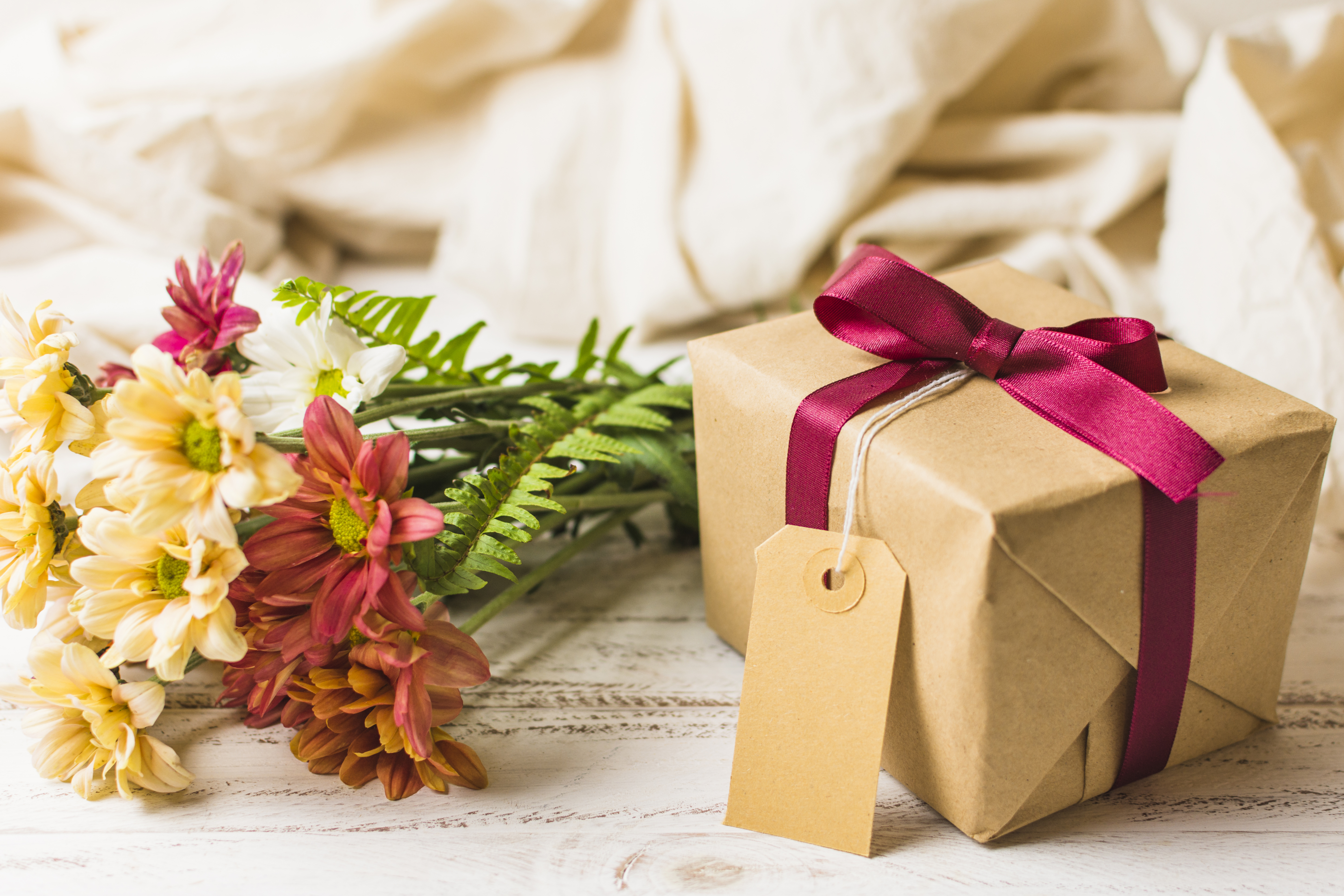 Wrapped gift with fresh flowers, ready for the registry